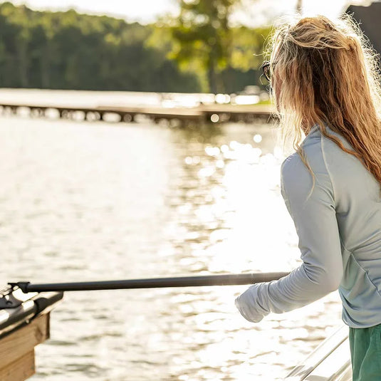 Woman using the rollable boat hook